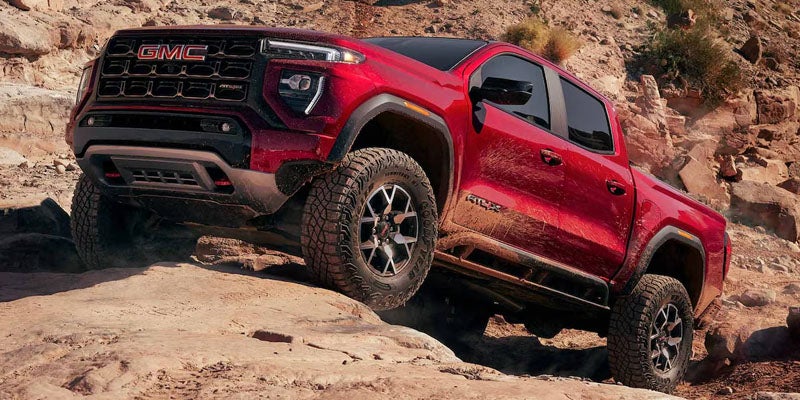 2026 GMC Canyon Elevation driving on rugged terrain