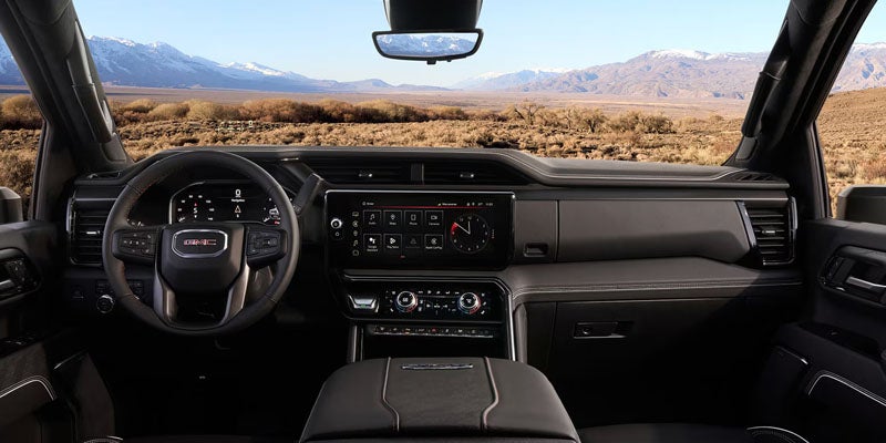 Spacious interior of the 2026 GMC Sierra 2500 HD with premium seating and driver-focused cabin