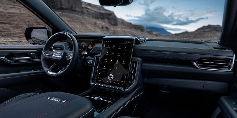 Premium interior of the 2026 GMC Yukon featuring spacious three-row seating and refined comfort