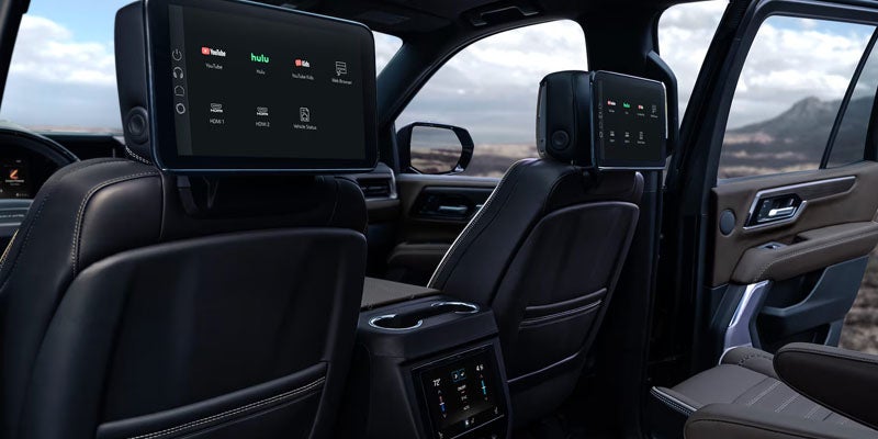 Premium rear seating and entertainment system inside the 2026 GMC Yukon